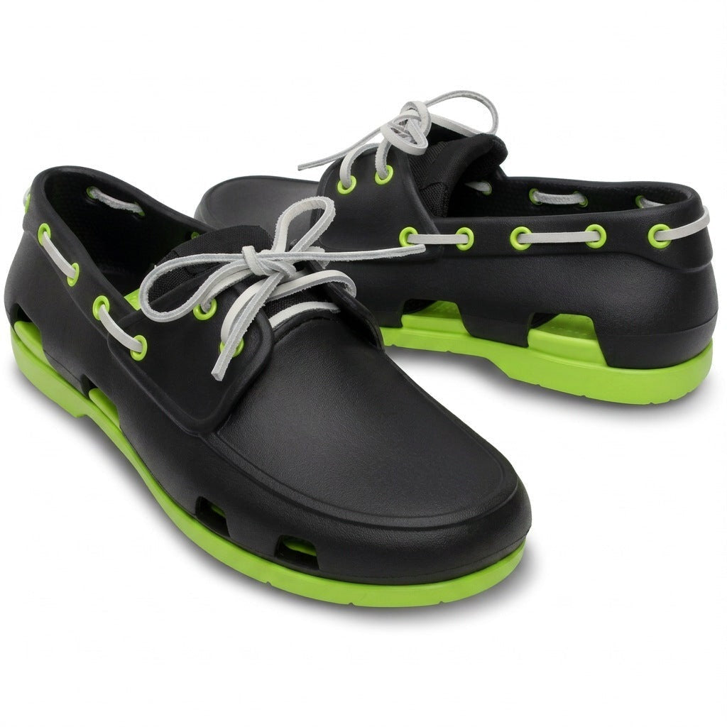 Par de náuticos de goma negro y verde lima