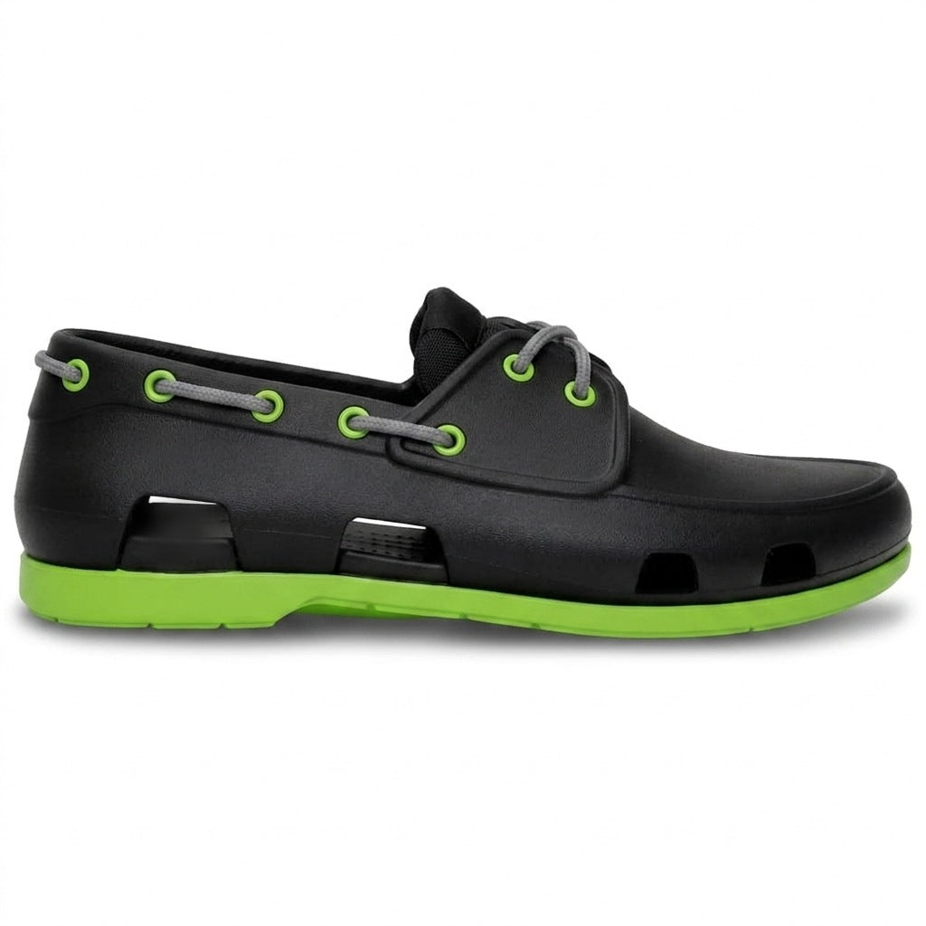 Náutico de goma hombre negro con suela verde lima, vista lateral