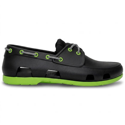 Náutico de goma hombre negro con suela verde lima, vista lateral