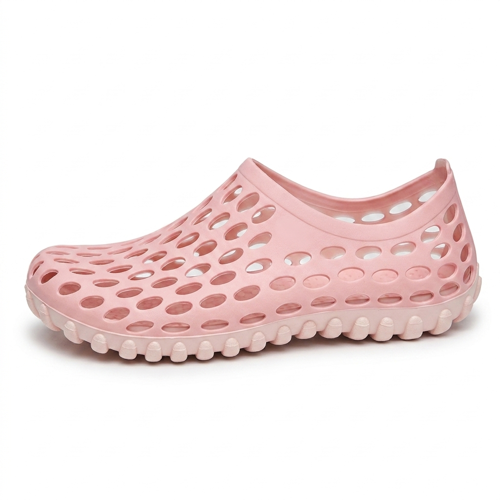 Zapatos de agua unisex en rosa, zueco de goma perforada, vista lateral