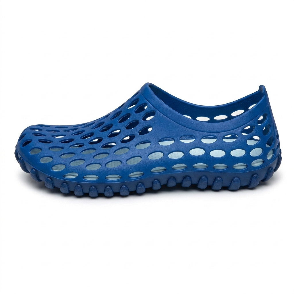 Zapatos de agua unisex en azul, zueco de goma perforada, vista lateral