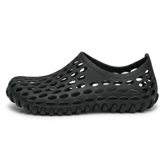 Zapatos de agua unisex en negro, zueco de goma perforada, vista lateral