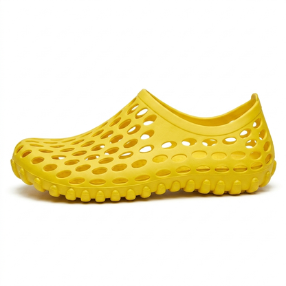Zapatos de agua unisex en amarillo, zueco de goma perforada, vista lateral