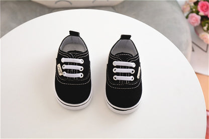 zapatos bebe estilo vans negros suela goma frontal