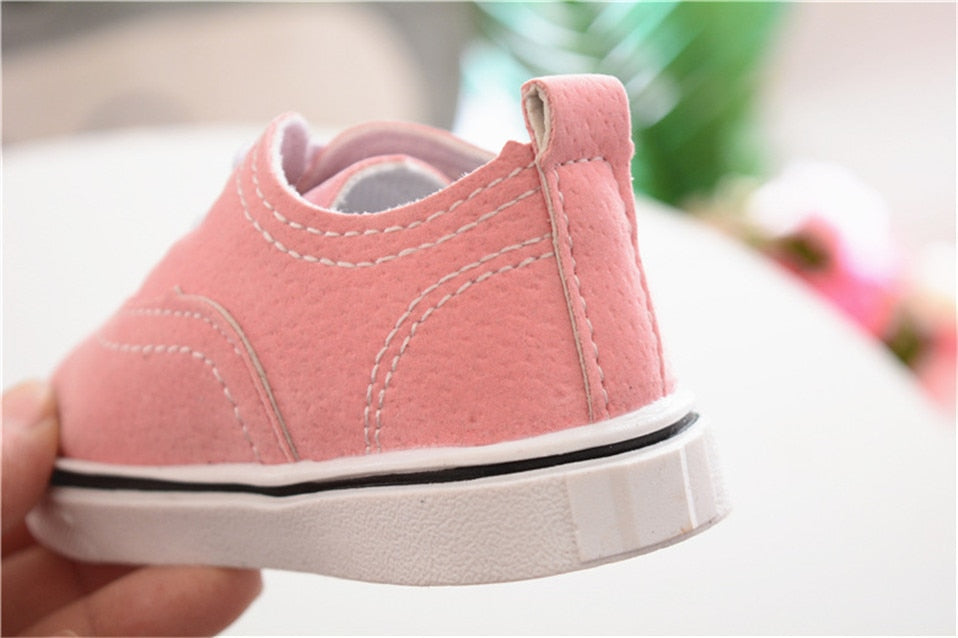 zapatillas bebe vans rosa parte posterior suela goma